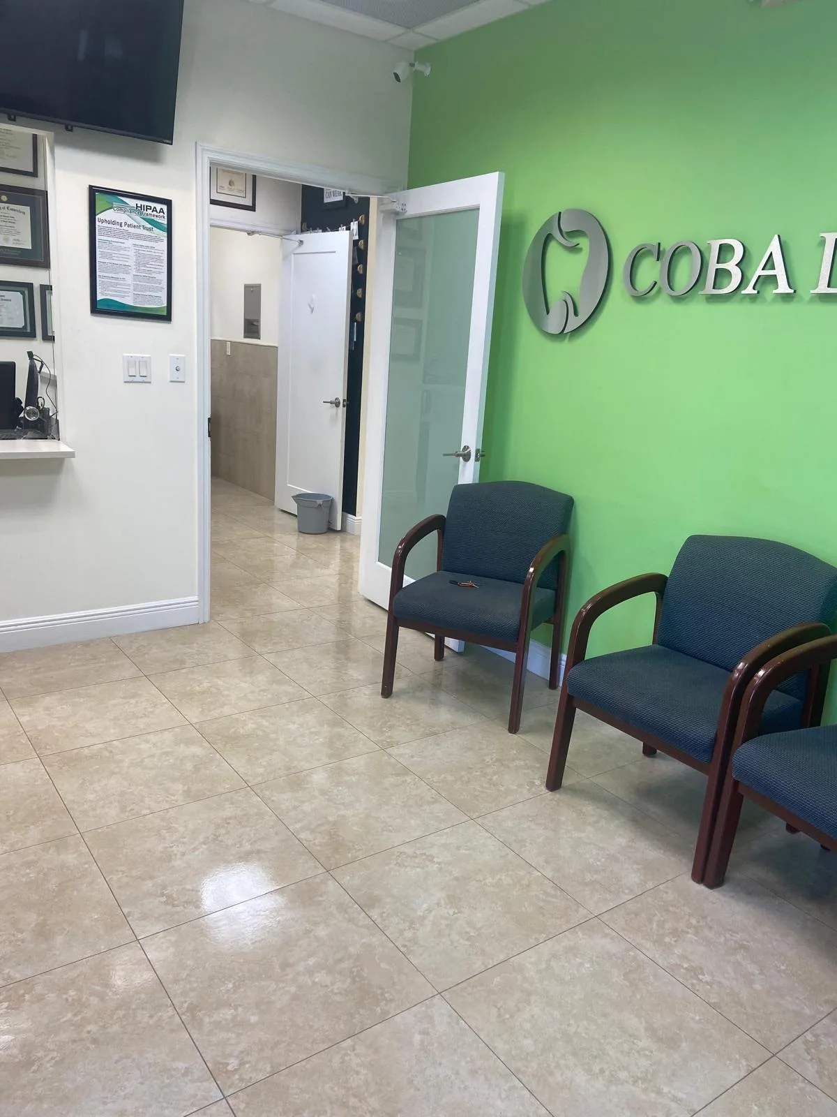 Reception area cleaned with seating and floors spotless